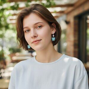 Enchanting Petal Dreams: Sky Blue Butterfly Earrings with Delicate Pink Accents